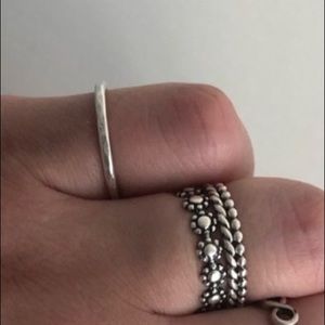 4 sterling silver rings (size 7 and 7.5)